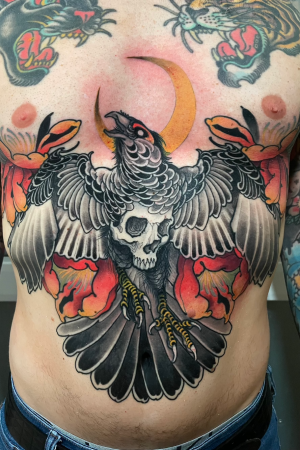 Crow And Skull Chest Tattoo